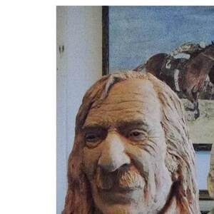 Clay bust of Jack Hirschman